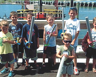 Seven grandsons at a family reunion preparing for the pirate ship ride on the Ocean.....ARGGGG! From left are Kyle Saul, 4, of North Royalton, Ohio; Tyler Saul, 6, of Beverly Hills, Calif.; Cameron Saul, 6, of North Royalton; Jake Burns, 7, of Avon, Ohio; Connor Saul, 9, of Beverly Hills; and Owen Burns, 5, of Avon. In front is Colin Burns, 3, of Avon. Sent by grandma Cathy.