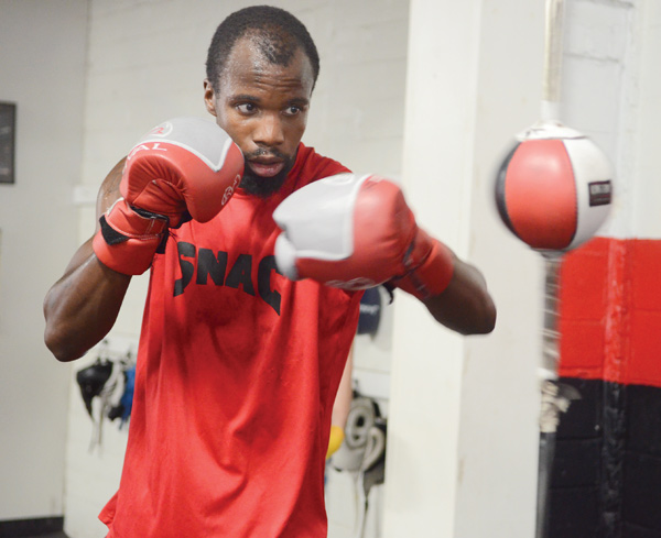 Junior middleweight boxer Willie Nelson works out at the Southside Boxing Club in Youngstown for his upcoming
10-round bout against Mexico’s Luis Grajeda on Friday in Nevada. It will be Nelson’s first time back in the ring after a 13-month hiatus.