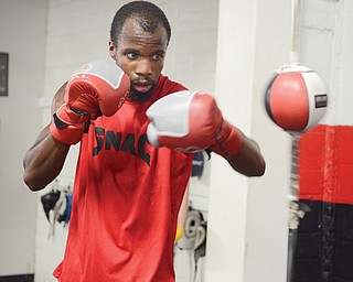 Junior middleweight boxer Willie Nelson works out at the Southside Boxing Club in Youngstown for his upcoming
10-round bout against Mexico’s Luis Grajeda on Friday in Nevada. It will be Nelson’s first time back in the ring after a 13-month hiatus.