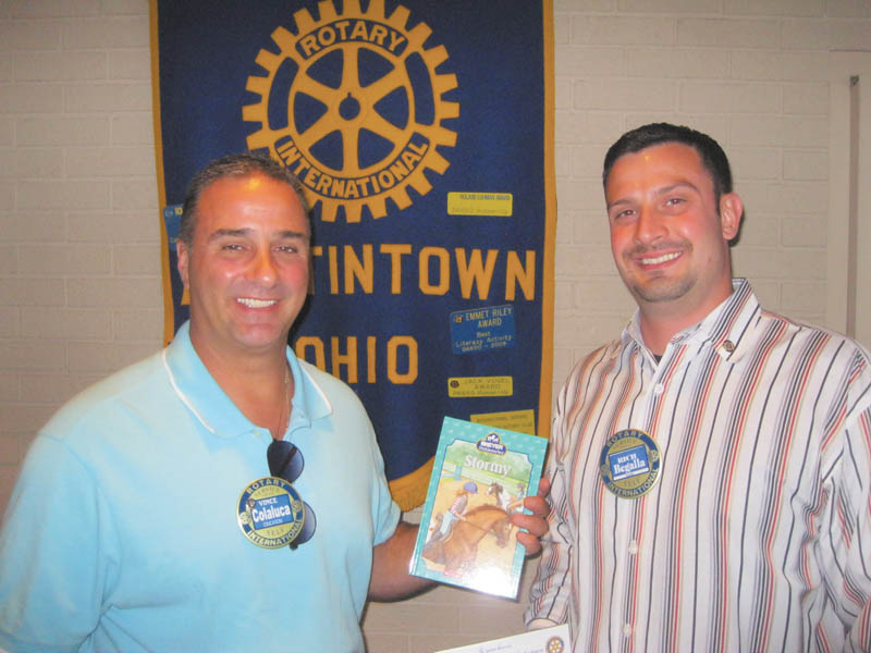 SPECIAL TO THE VINDICATOR
At a recent meeting, the Rotary Club of Austintown featured guest speakers Richard Begalla from Window Depot Corp., and Susan Jacobs from the Austintown Senior Center’s art program. Begalla is the director of personnel training for Window Depot and a new member of Rotary. Jacobs has been an instructor at the center for the past three years and is a retired art teacher from Mathews schools. Each speaker was presented with a book to be donated to Austintown Elementary School Library in honor of their presentations. Above are Vince Colaluca, left, Rotary president, and Begalla. Below are Ed Kalaher, left, Rotary secretary, and Jacobs.