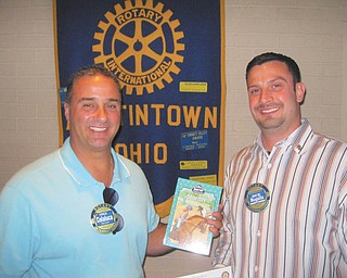 SPECIAL TO THE VINDICATOR
At a recent meeting, the Rotary Club of Austintown featured guest speakers Richard Begalla from Window Depot Corp., and Susan Jacobs from the Austintown Senior Center’s art program. Begalla is the director of personnel training for Window Depot and a new member of Rotary. Jacobs has been an instructor at the center for the past three years and is a retired art teacher from Mathews schools. Each speaker was presented with a book to be donated to Austintown Elementary School Library in honor of their presentations. Above are Vince Colaluca, left, Rotary president, and Begalla. Below are Ed Kalaher, left, Rotary secretary, and Jacobs.