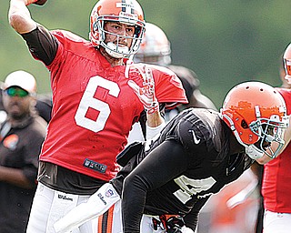 Cleveland Browns quarterback Brian Hoyer passes during practice Tuesday at the team’s training camp in Berea.