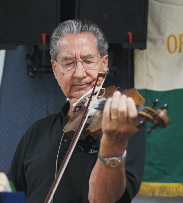 Steve Pal of Akron plays the violin with the band The Hungarians during the 87th annual Hungarian Day Festival at the Aut Mori Grotto Hall, 563 N. Belle Vista Ave., Youngstown on Sunday.