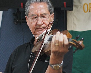 Steve Pal of Akron plays the violin with the band The Hungarians during the 87th annual Hungarian Day Festival at the Aut Mori Grotto Hall, 563 N. Belle Vista Ave., Youngstown on Sunday.