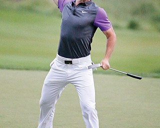 Rory McIlroy, of Northern Ireland, celebrates winning the 96th PGA Championship on Sunday at Valhalla Golf Club in Louisville, Ky. McIlroy battled heavyweight contenders including Phil Mickelson, Henrik Stenson and Rickie
Fowler to win the season’s final major by one shot.