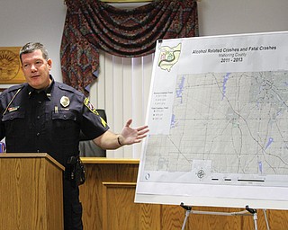 Scott Weamer, assistant police chief for the city of Canfield, shows where alcohol-related accidents, some fatal, took place in Mahoning County from 2011 to 2013. The Mahoning County Operating a Vehicle While Impaired Task Force had a press conference Tuesday to say task force officers will step up patrols as part of the Drive Sober or Get Pulled Over national initiative.