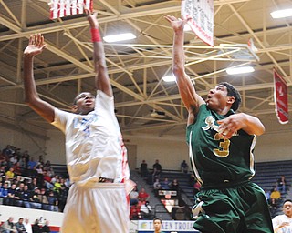 Ursuline’s Mark Hughes puts up a shot against Cleveland Villa Angela-St. Joseph during a regional final at the
Canton Fieldhouse. Hughes has committed to Wright State to continue his basketball and academic careers.