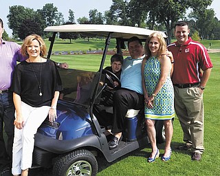 SPECIAL TO THE VINDICATOR
Participating in the annual PAR golf tournament are, from left, Dominic Marchionda, event chairman; Jacqueline Marchionda, event chairwoman; Christopher Marchionda, Ed Muransky, and Chris Muransky, honorary chairmen; and Ryan Allison, WYTV sports director.