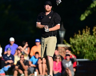 CANFIELD, OHIO - AUGUST 16, 2014: Jason Murdock watches as his ball flies in the air during the longest drive contest Saturday evening at Tippecanie Country Club. (Photo by David Dermer/Youngstown Vindicator)