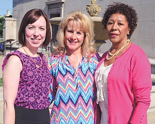 Junior League of Youngstown President Kelly Kiraly, left, Honorary Chair, Karen Covelli, center, and committee member Patricia Greene, right, will attend the 20th anniversary of the Junior League of Youngstown's Pink Ribbon Tea honoring breast cancer survivors on August 25 at noon at Stambaugh Auditorium.