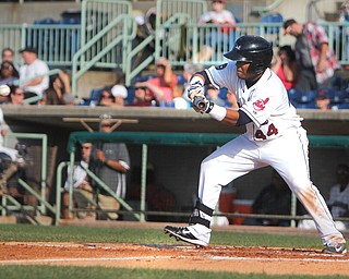Steven Patterson of the Scrappers lays down a bunt during Sunday’s game against the Williamsport Crosscutters in Niles.