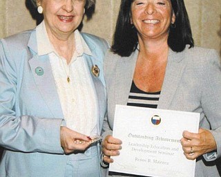 SPECIAL TO THE VINDICATOR
MaryEllen Laister, left, 2012-2014 General Federation of Women’s Clubs president, recently presented Renee Maiorca, member of GFWC Ohio Northeast District and 2014-2015 president of Warren Junior Women’s League, with her Leadership Education and Development Seminar graduate certificate. Maiorca traveled to the GFWC International Convention in Chandler, Ariz., to become qualified to assume leadership positions in GFWC beyond her club and serve with distinction.