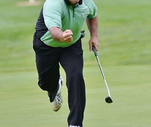 Jeff Lange | The Vindicator  Rick Leonard of Niles celebrates as his putt drops into the hole, during the Greatest Golfer event held at the Lake Club on Monday.