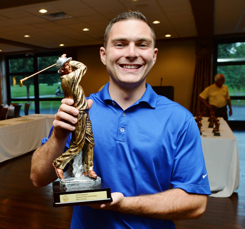 Jeff Lange | The Vindicator  Jim Armeni and his trophy for his 339 yard winning drive in the men's longest drive competition.