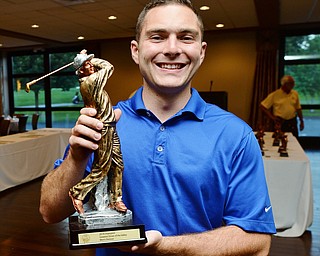 Jeff Lange | The Vindicator  Jim Armeni and his trophy for his 339 yard winning drive in the men's longest drive competition.
