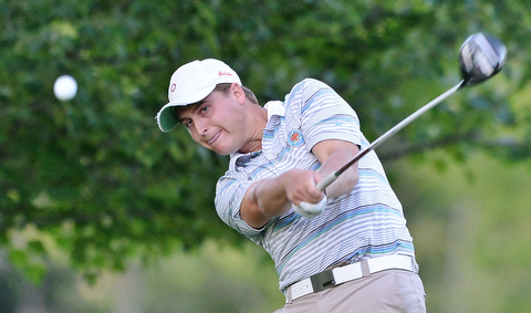 Jeff Lange | The Vindicator  Mark Olbrych watches his shot from the tee in the longest drive competition.