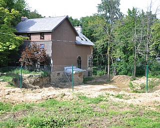 12 Poland Manor, located directly behind Poland Presbyterian Church, has been under construction since 2010 with little progress made over the past four years. Residents of Poland Manor are upset about the property, saying it disturbs the tranquillity of their neighborhood and has had a negative effect on the value of their homes.