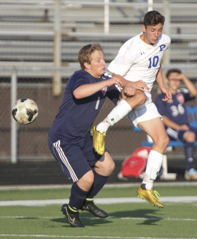 William D. Lewis the Vindicator  Poland's Anthony Sabula(10) and Fitch's Tex Martin(1) go for the ball during Tuesday 8-19-14 action at Poland.