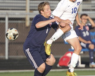 William D. Lewis the Vindicator  Poland's Anthony Sabula(10) and Fitch's Tex Martin(1) go for the ball during Tuesday 8-19-14 action at Poland.