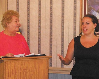 SPECIAL TO THE VINDICATOR
The Tri-Gold Chapter of the American Business Women’s Association presented a $1,500 scholarship to Becca Potkanowicz at its June meeting. Sarah Janutolo, left, education chairman, introduced Potkanowicz to the chapter. She is a graduate of Poland High School and a member of the National Honor Society. She plans to study broadcasting at Youngstown State University. Her father, Dan Potkanowicz, and grandparents, Dave and Cathy Poorman, all of Poland, attended.