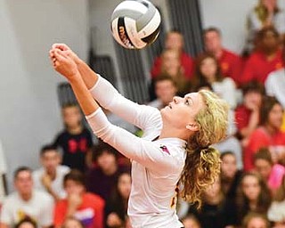 Maddie Abrigg of Cardinal Mooney hits the ball back over the net during Thursday’s home game against South Range.