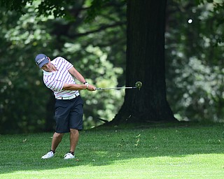 YOUNGSTOWN, OHIO - AUGUST 23, 2014: Matt Gurska chips out of the short rough on a hole on the back 9 of the Youngstown Country Club during the Vindy Greatest Golfer Tournament. (Photo by David Dermer/Youngstown Vindicator)