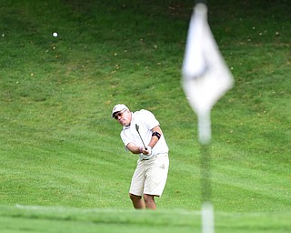 YOUNGSTOWN, OHIO - AUGUST 23, 2014: Bob Kish follows through on his approach shot on a hole on the back 9 of the Youngstown Country Club during the Vindy Greatest Golfer Tournament. (Photo by David Dermer/Youngstown Vindicator)