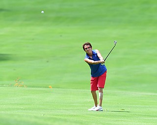 YOUNGSTOWN, OHIO - AUGUST 23, 2014: Jill Harmon follows through on her approach shot front 9 of the Youngstown Country Club during the Vindy Greatest Golfer Tournament. (Photo by David Dermer/Youngstown Vindicator)