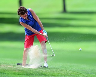 YOUNGSTOWN, OHIO - AUGUST 23, 2014: Jill Harmon chips out of the bunker front 9 of the Youngstown Country Club during the Vindy Greatest Golfer Tournament. (Photo by David Dermer/Youngstown Vindicator)