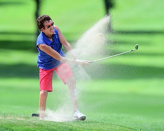 YOUNGSTOWN, OHIO - AUGUST 23, 2014: Jill Harmon chips out of the bunker front 9 of the Youngstown Country Club during the Vindy Greatest Golfer Tournament. (Photo by David Dermer/Youngstown Vindicator)