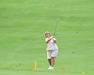 YOUNGSTOWN, OHIO - AUGUST 23, 2014: Patty Brant follows through on her approach shot on the front 9 of the Youngstown Country Club during the Vindy Greatest Golfer Tournament. (Photo by David Dermer/Youngstown Vindicator)