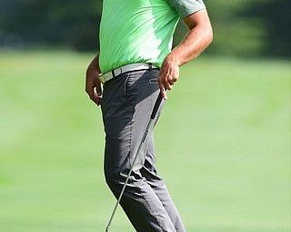 WARREN, OHIO - AUGUST 23, 2014: Griffin Todd of Canfield leaps in the air after missing a putt on the 1st hole Saturday morning at Trumbull Country Club during the Vindy Greatest Golfer Tournament. (Photo by David Dermer/Youngstown Vindicator)