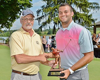 Jeff Lange | The Vindicator  10-14 Handicap Division champ Griffin Todd with The Vindicator's Ted Suffolk.
