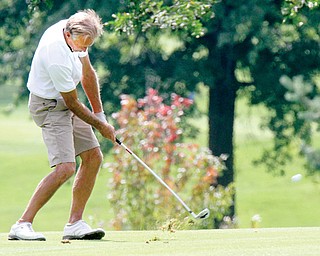 Youngstown’s Dick Marlowe aims for the green during Monday’s USGA Senior Amateur Qualifier at Tippecanoe Country Club in Canfield. Marlowe won to qualify for next’s month’s U.S. Senior Amateur tournament in California.