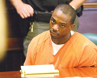 Janero Mitchell of Youngstown listens as Judge James C. Evans of Mahoning County Common Pleas Court sentences him to life in prison without parole in the 2012 slaying of Mark Haskins. At his sentencing Monday, Mitchell, 29, maintained he was innocent.