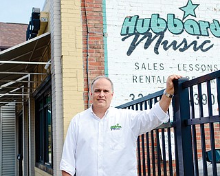 Mark Tirabassi is shown outside his Hubbard Music store at 51 N. Main St. “The industry does recognize me and has reached out to me,” he said. “Which to me is an accomplishment.” The store offers new and used instruments and also has online sales.