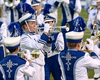 Jeff Lange | The Vindicator  Lakeview senior Megan Laws rips out a trumpet solo amidst a sea of blue and white during the band's performance of Kansas' hit 'Carry on my Wayward Son' during Friday night's halftime show in Hubbard.