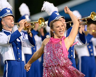 Jeff Lange | The Vindicator  Hubbard majorette Olivia Bevan performs a dance routine as the band plays.
