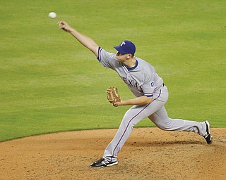 Texas Rangers relief pitcher Phil Klein throws during a game against the Miami Marlins. Klein is a former Youngstown State pitcher who made his major-league debut with the Rangers a month ago.