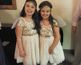 Mikayla Upright, daughter of Jennifer Upright, and Kayde Strahin, daughter of Brandon and Bridget Strahin, all of Youngstown, have been best friends since birth. They are dressed as angels for a Christmas play at Simon Road Church of God in Boardman.