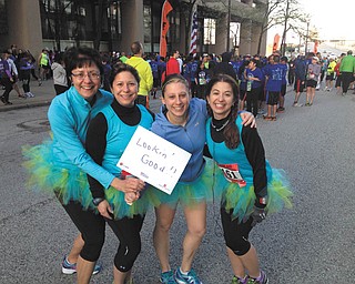This photo is before the Cleveland Half Marathon in May 2014. Yes, they are wearing tutus! They are Laurie Flowers, left, of Boardman, Michelle Hirschl of Canfield, Laurie DeMarco of Austintown and Natalie Lariccia of Canfield. Sent by DeMarco.