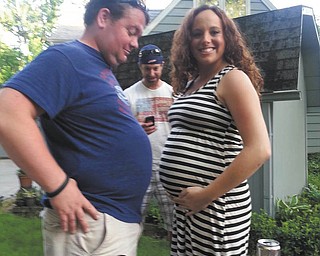 Friends Benny and Allison of Youngstown share a common moment in their lives.