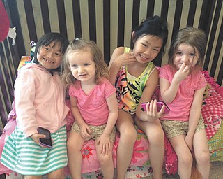 Sisters, Anna and Rachel, from Stow, Ohio, visiting cousins Claire and Caesen from Round Rock, Texas. From left are Anna Marie Steuart, 6; Claire Giovanna Shreve, 2 1/2; Rachel Lee Steuart, 9; and Caesen Emmalina Shreve, 4. Sent by grandparents Ed and Jackie Chrapcynski of Struthers.