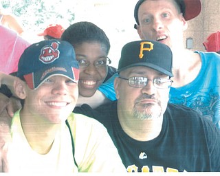 Best friends work together at Meshel Masco County Board of Development Disabilities. In front are Bob of Canfield and Shawn of Austintown, and in back are Jocelyn and Jess, both of Youngstown. Sent by workshop specialist, Karla.