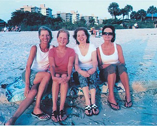 Neighborhood best friends visited Bonita Beach, Fla. in 2011 after their children were grown. From left are Susan Yerian, Julie Downie, Anne Kempe and Eileen Larson, all of Youngstown.