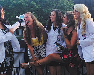 Samantha Wadman and friends during the Duquesne University white coat ceremony. They became very close as they worked toward their doctor of pharmacy degrees.