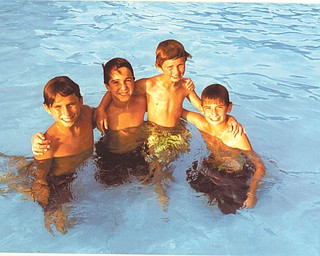 Swimming buddies are George Yanssens of Lexington, S.C., Jack Phillips and Matthew Kay, both of Youngstown, and Ryan Yanssens of Lexington, S.C.