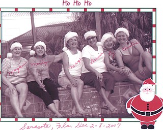 Six friends visited Florida for a vacation and wore Santa hats everywhere they went. They are Mary Ann Jenkins of Youngstown, Marilyn Blissenbach of Struthers, Marge Chrysarkoff of Copley, Denise Cutrone of Campbell, Regina Yurich of Struthers and Christine Herche of Cincinnati. Submitted by Yurich.