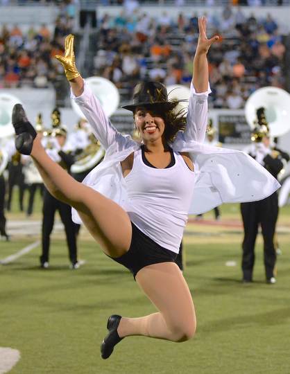 Jeff Lange | The Vindicator  Kristina Marino, senior at Harding high school dances to the band's performance of a Michael Jackson medley, Friday night in Warren.
