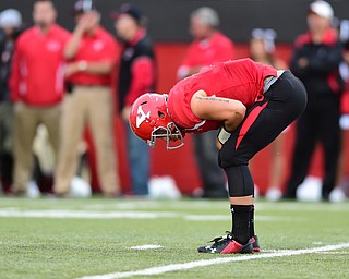YOUNGSTOWN, OHIO - SEPTEMBER 6, 2014: Quarterback Dante Nania #3 of YSU reacts after throwing a incomplete pass on 3rd and 8 during the 4th quarter of Saturday afternoon game at Stambaugh Stadium. YSU won 34-23. (Photo by David Dermer/Youngstown Vindicator)
